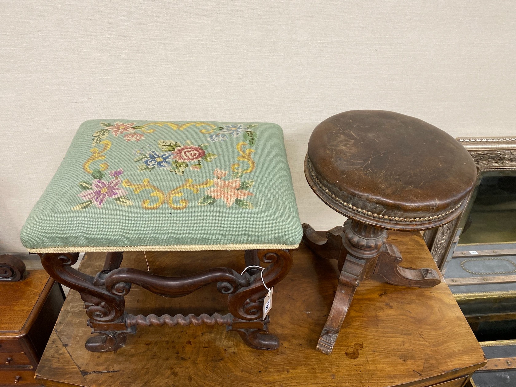 A Victorian rosewood dressing stool and a revolving adjustable piano stool